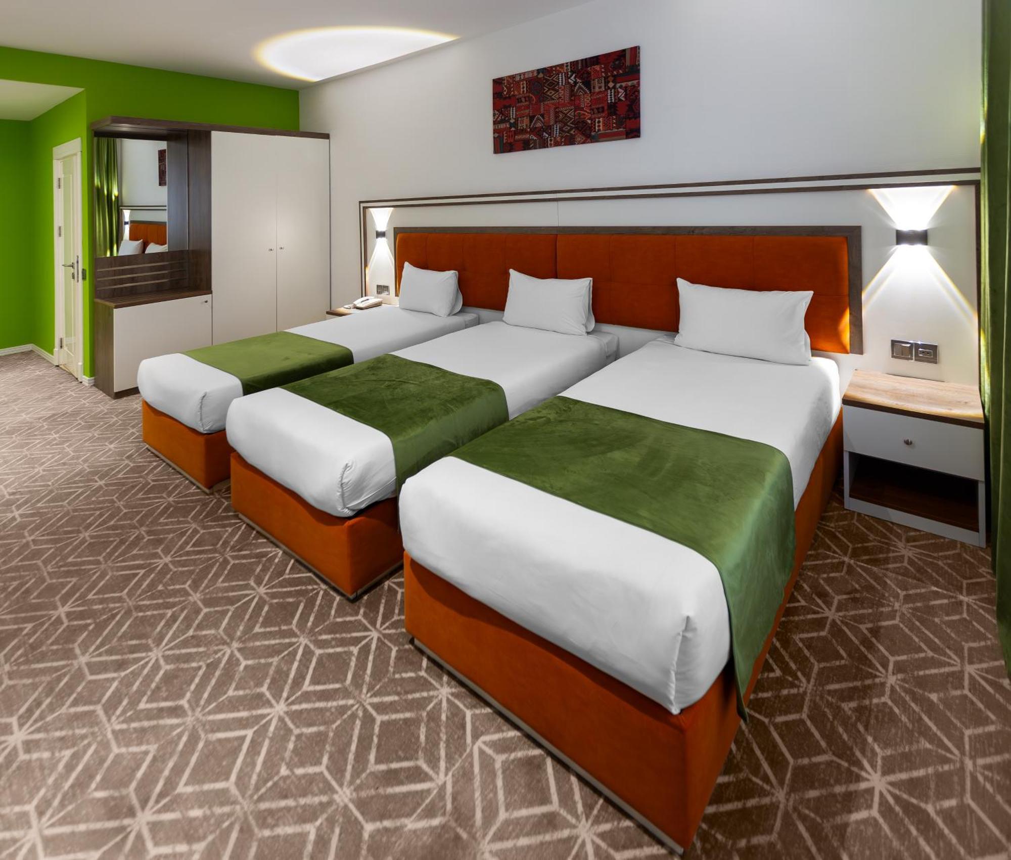 Alba Hotel & Spa Baku Exterior photo A typical Premier Inn room